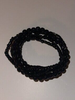 Stack of Black Bracelets